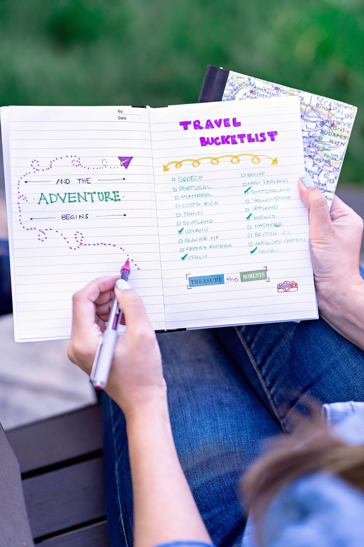 Journal pages with a travel bucket list